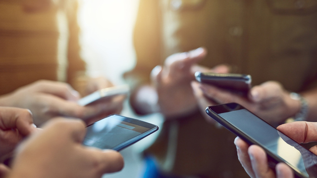 students on cell phones