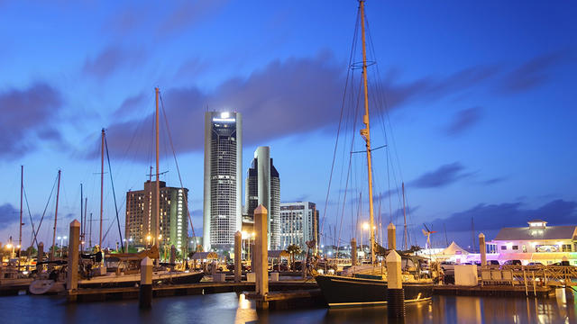 Sailboats in the harbor of Corpus Christi with the city in the background