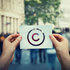 Person holding paper with copyright symbol